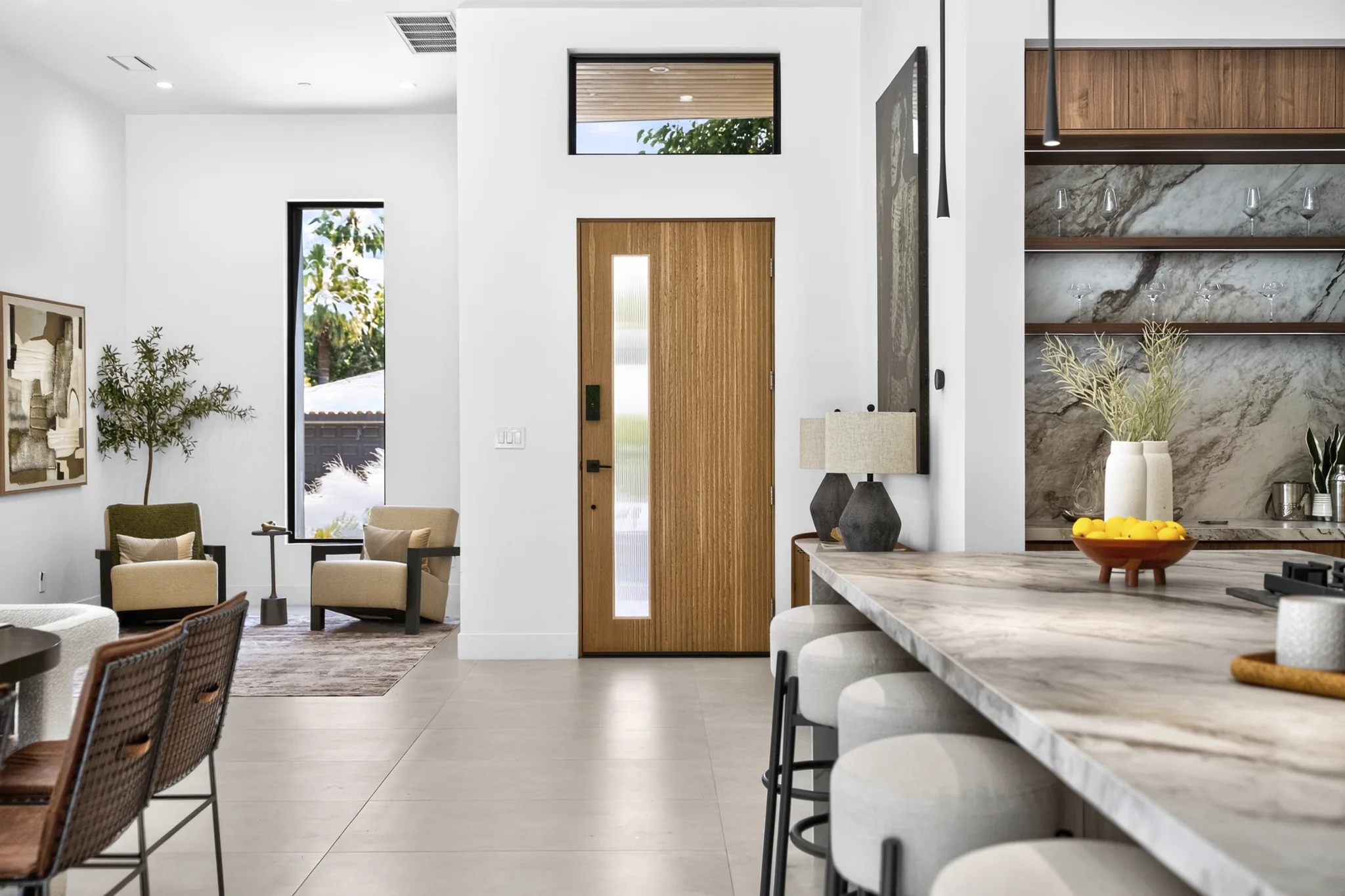 Alameda: entry and dining area with tall glazing