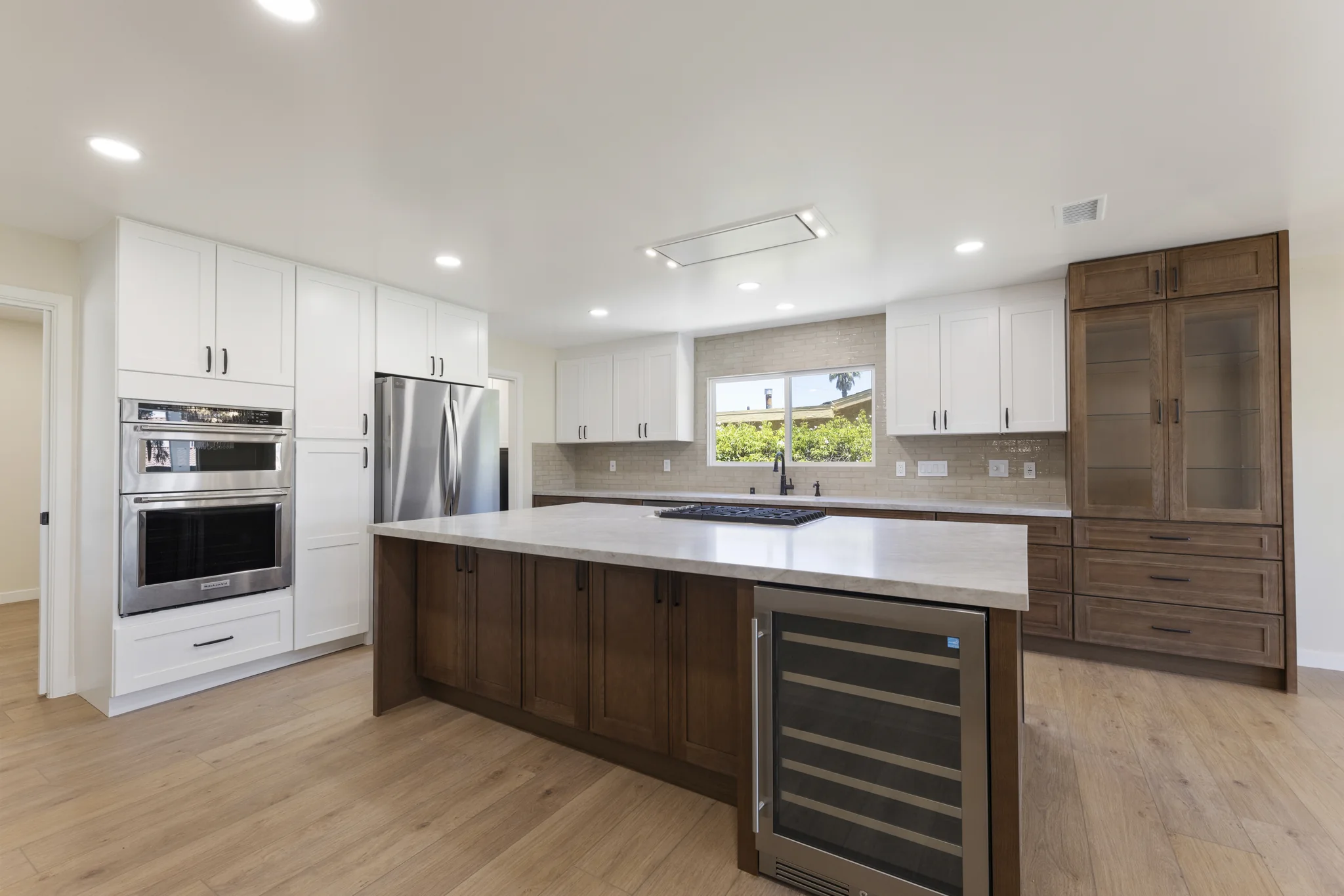 Álvarez: timber kitchen island and built-in appliances