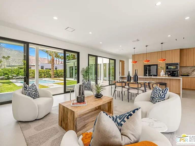 Amado: open living area and kitchen beside sliding garden doors
