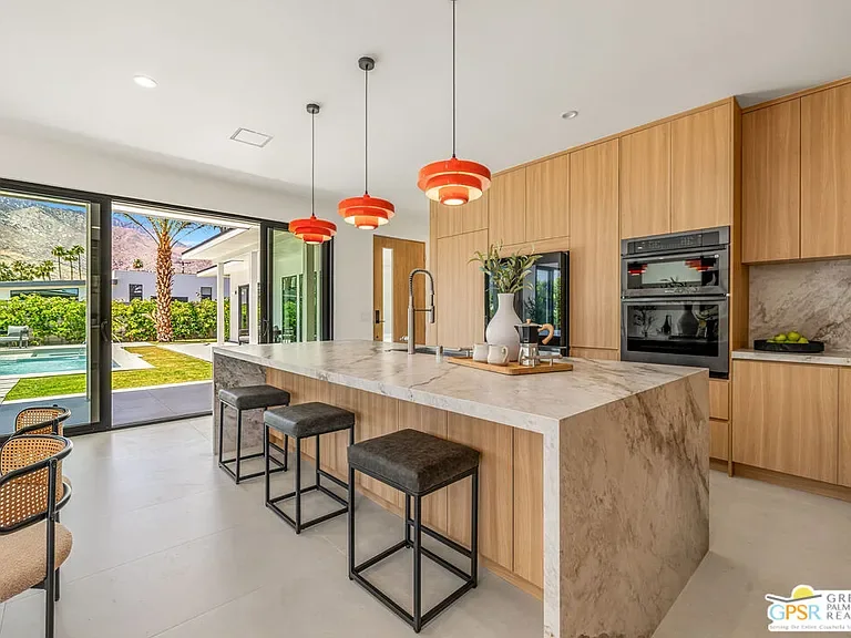 Amado: kitchen and island overlooking the garden