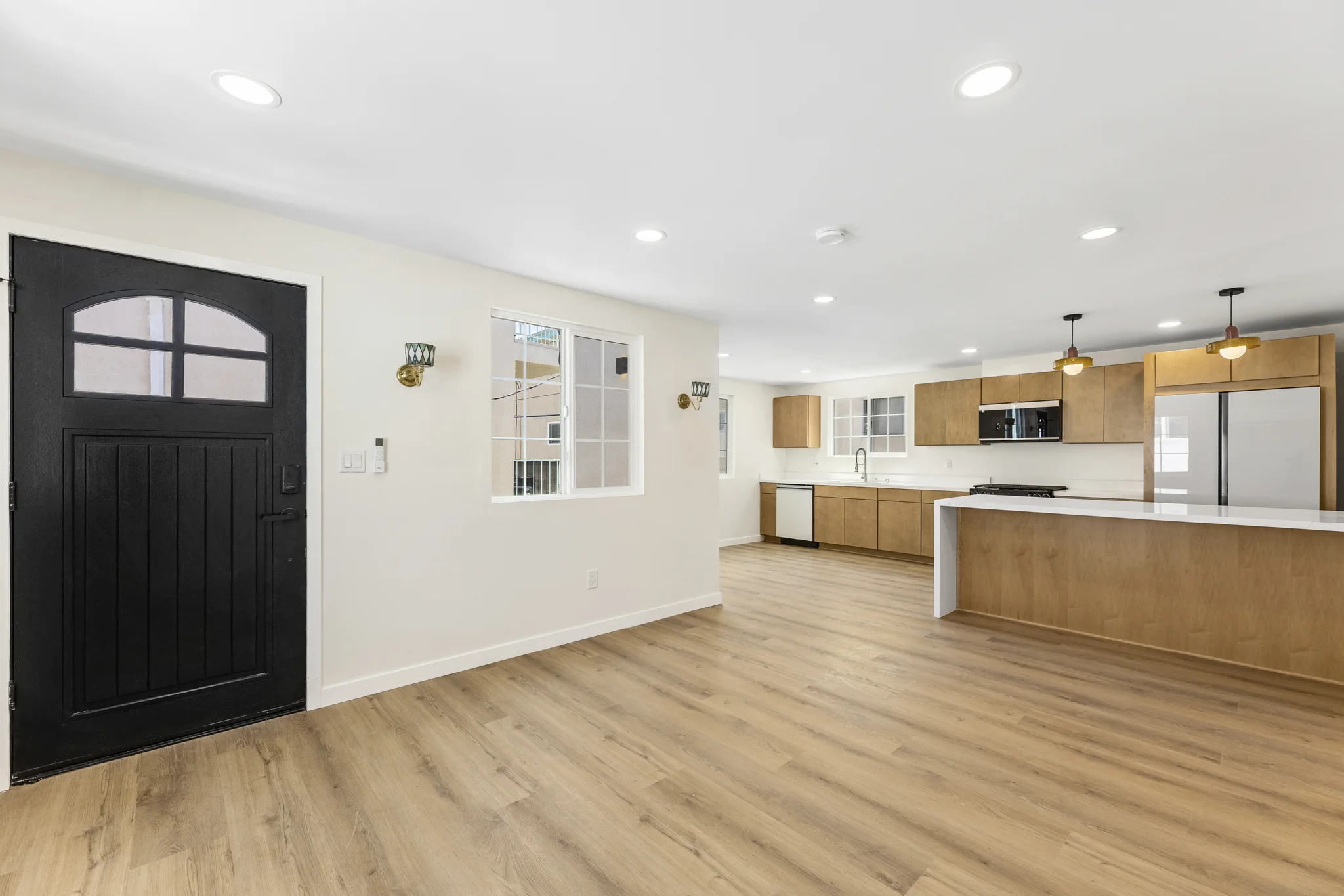 Sherbourne: living area connecting the entry and kitchen