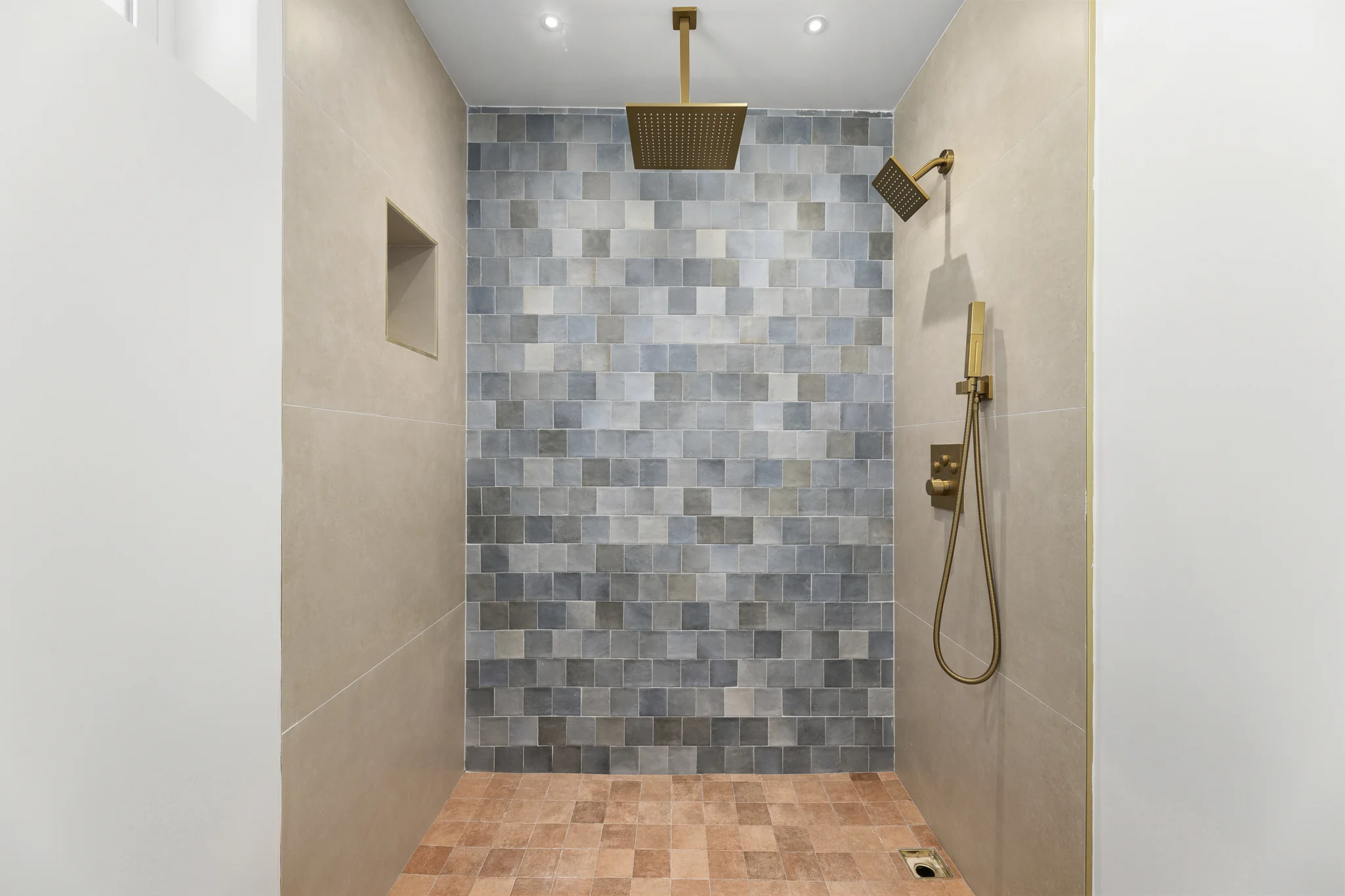 Sherbourne: tiled shower with brass fittings
