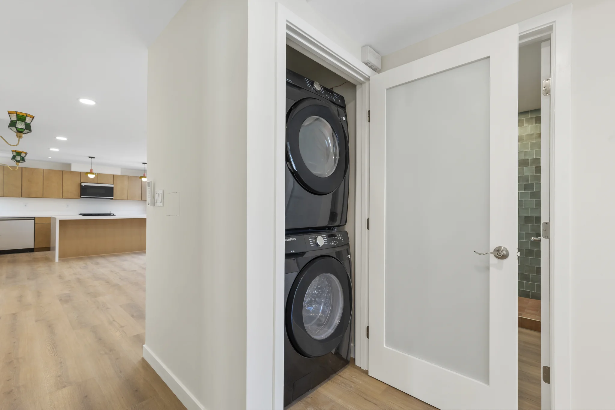 Sherbourne: laundry closet with stacked appliances