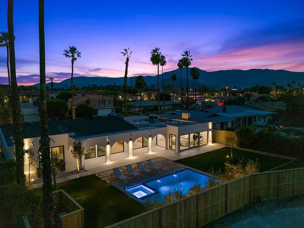 Vista Grande: aerial view of the illuminated property at dusk
