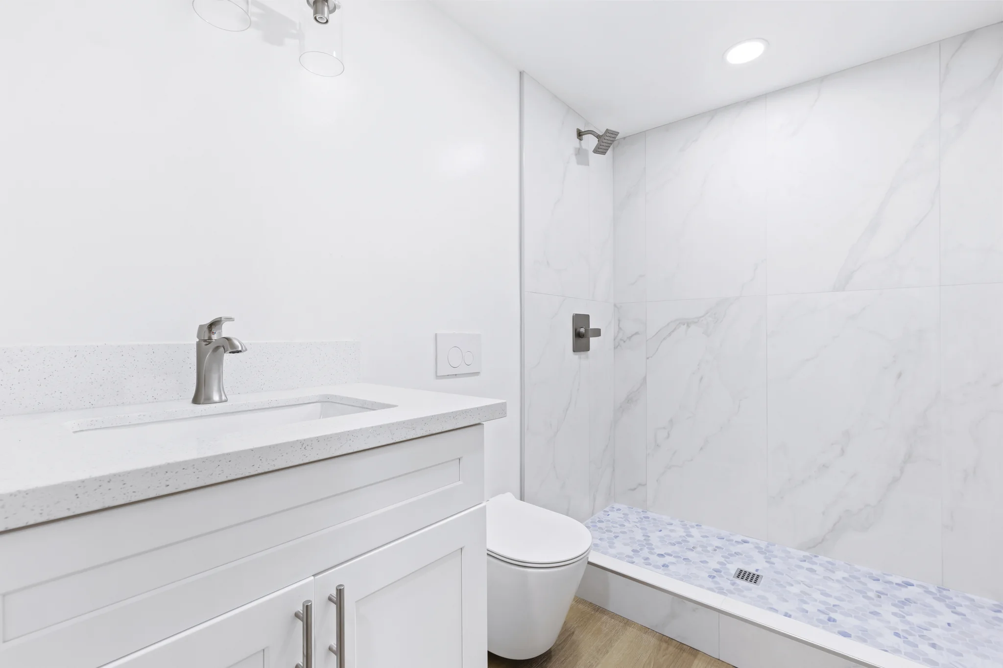 Walnut: bathroom with a vanity and tiled shower
