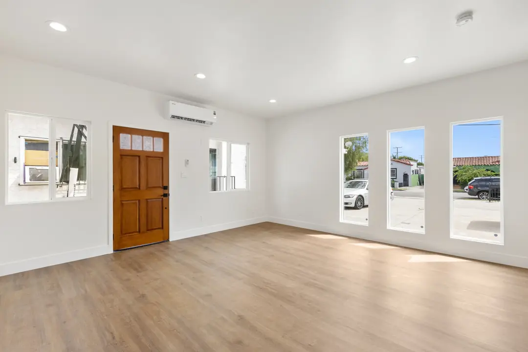 20th St.: living area beside wood entry door