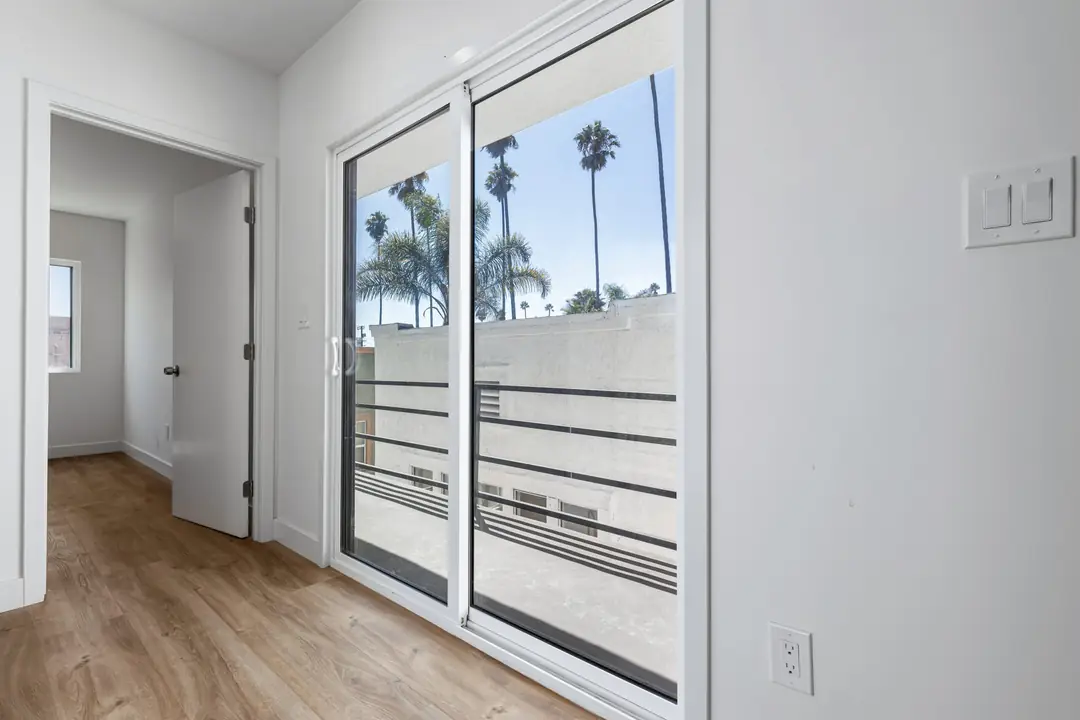 Cimarron: glazed door opening toward an exterior landing