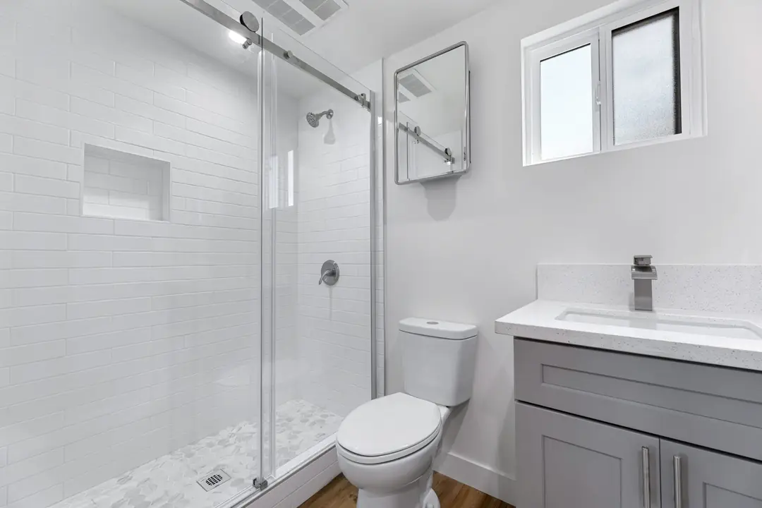 Cimarron: bathroom with tub and gray vanity