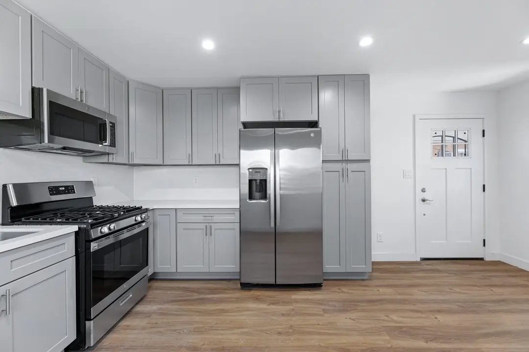 Cimarron: gray kitchen cabinets and stainless appliances
