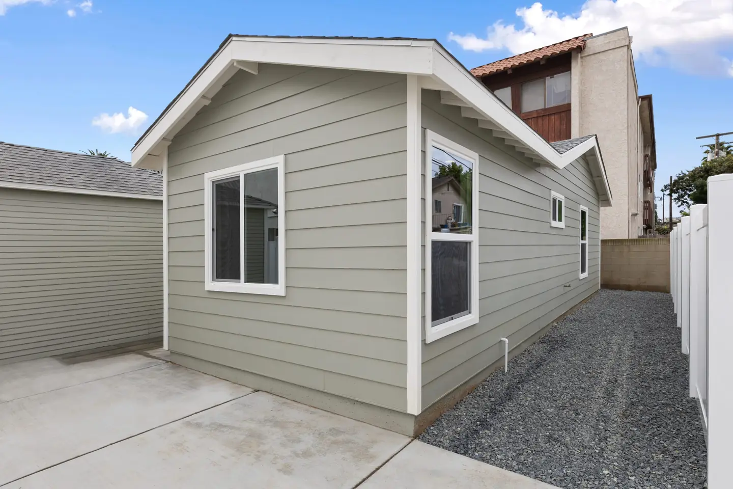Colorado: siding and gabled exterior beside side path