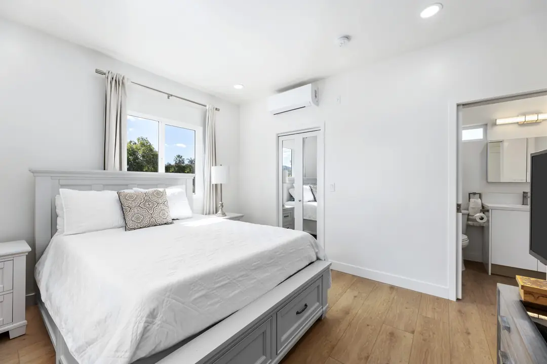 Lancewood: furnished bedroom with mirrored storage