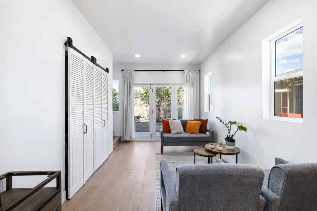Lancewood: living room opening toward the garden