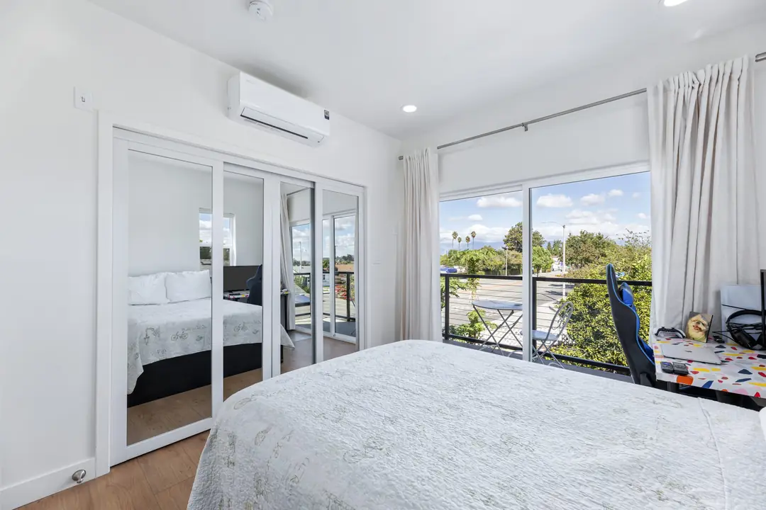 Lancewood: bedroom opening toward balcony