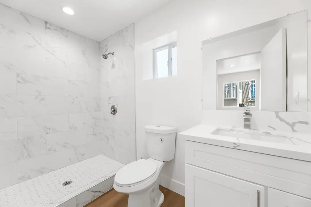 Magnolia: bathroom with tiled tub surround