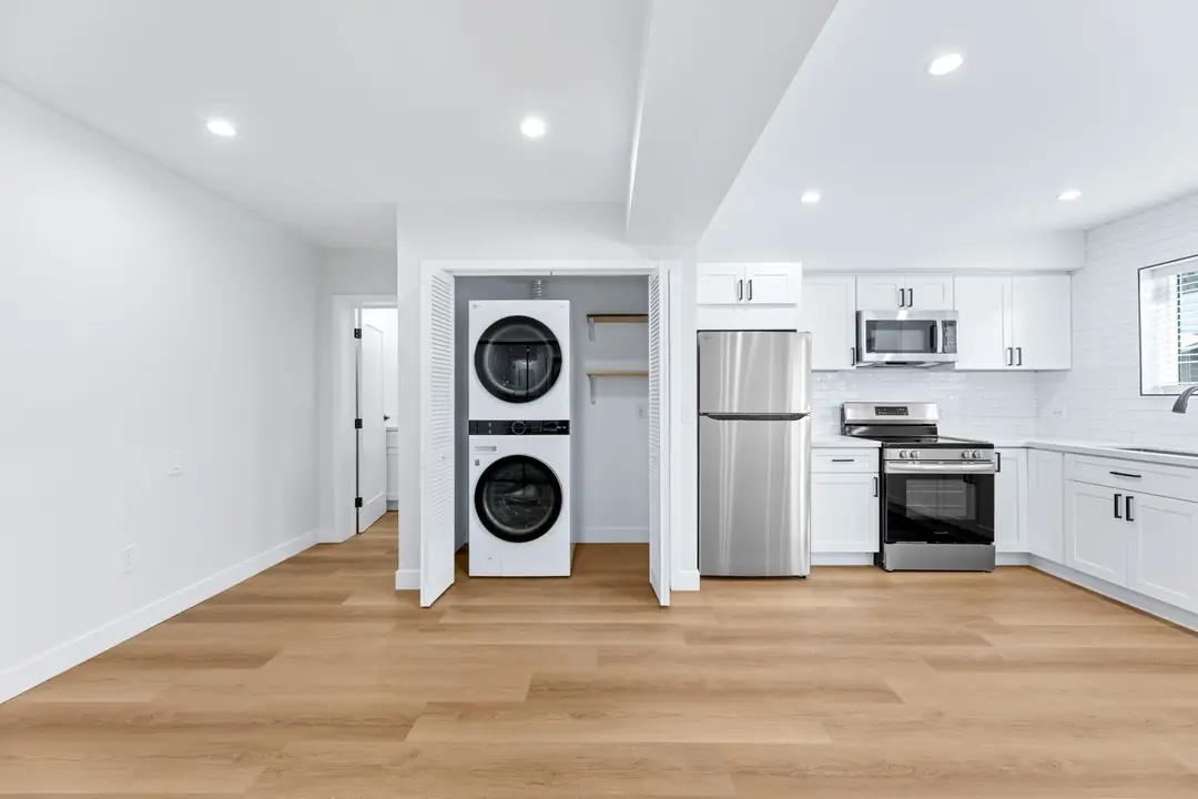 Molino: laundry closet beside compact kitchen