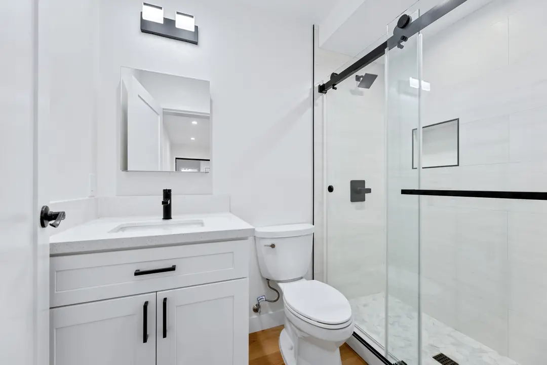 Molino: bathroom with glass shower enclosure