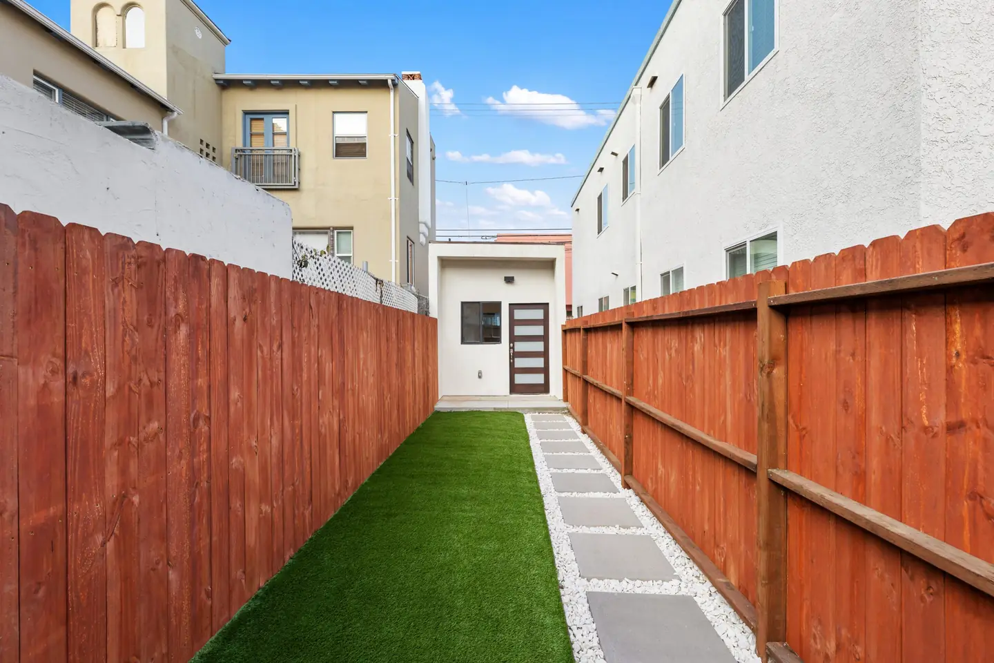 Ocean: narrow fenced path leading to entry