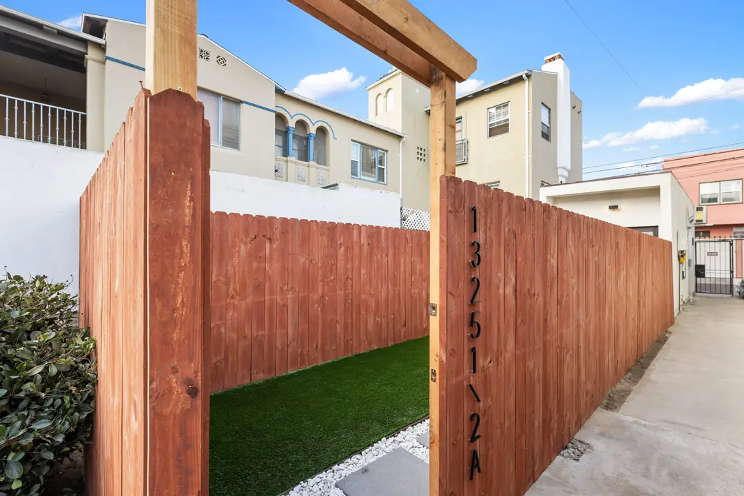 Ocean: timber gate and fenced outdoor area