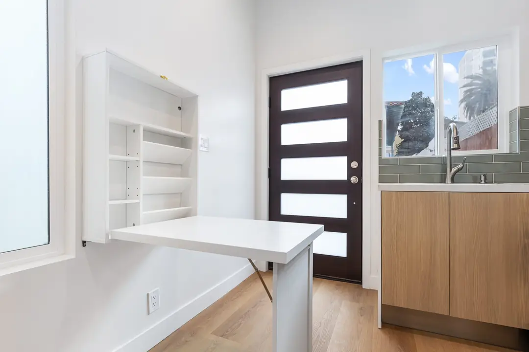 Ocean: folding work surface beside entry
